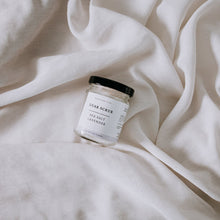 Muatkan imej ke dalam penonton Galeri, Flat lay of sea salt lavender body scrub with neutral background
